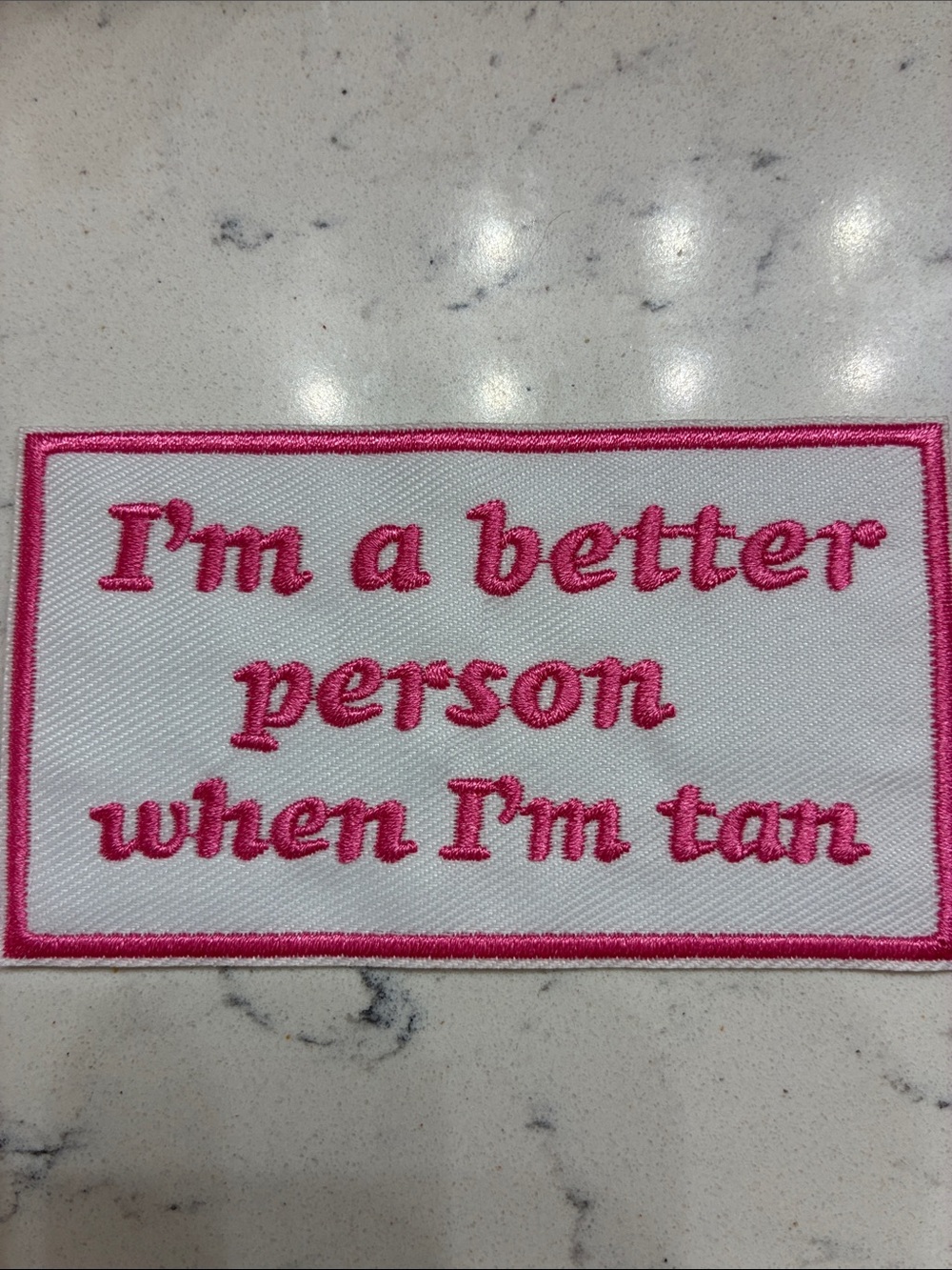 Pink & White Embroidered Statement Patch - "I'm a better person when I'm tan"